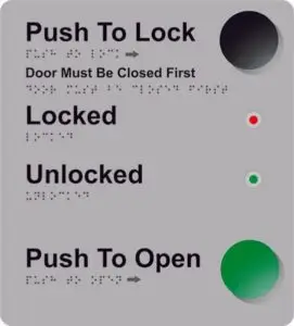 Internal automatic door control signage on a wall